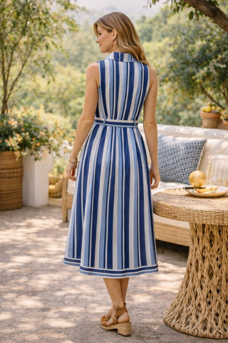 Blue multi-stripe 100% rayon sleeveless midi dress with notched collar, full button-front closure, self-tie belt at waist, and A-line silhouette with navy border hem — Mirror on Main