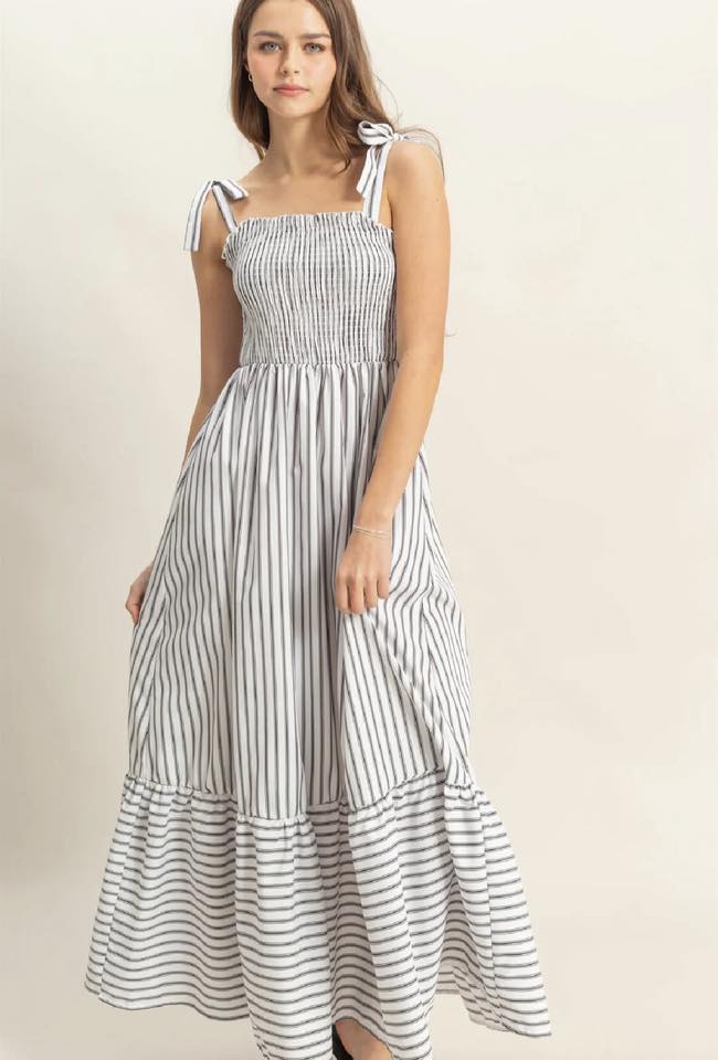 black and white striped smocked maxi dress with tie straps and tiered skirt