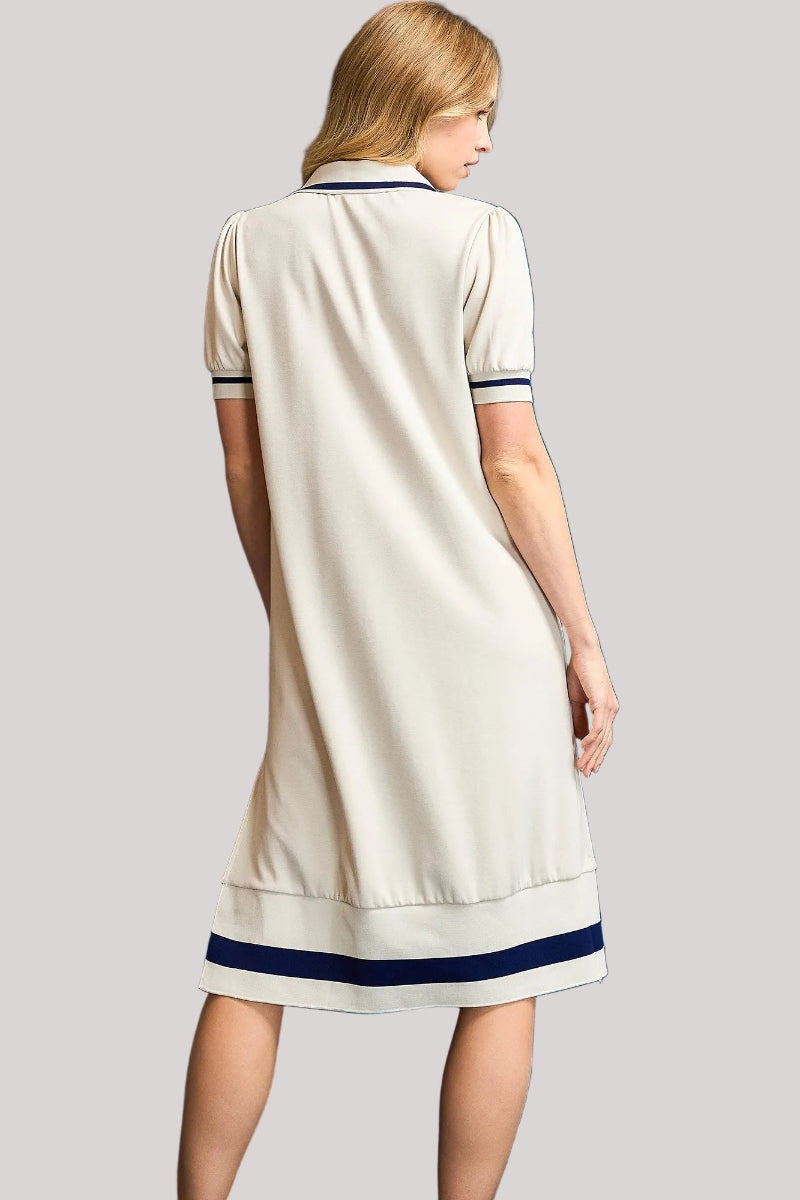 Ecru luxeknit midi dress with polo collar V-neckline, short puff sleeves with ribbed navy trim, navy contrast stripe hem band, and side slit — Mirror on Main