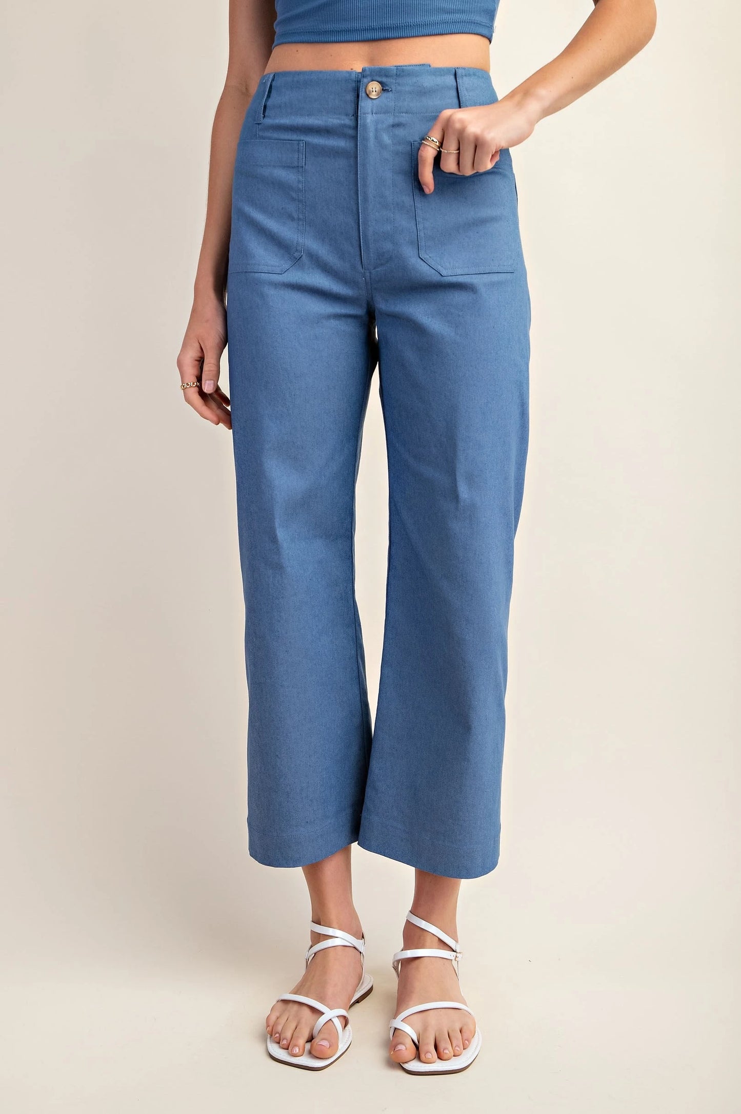 high rise cropped stretch pants in denim blue and apple green with front pockets