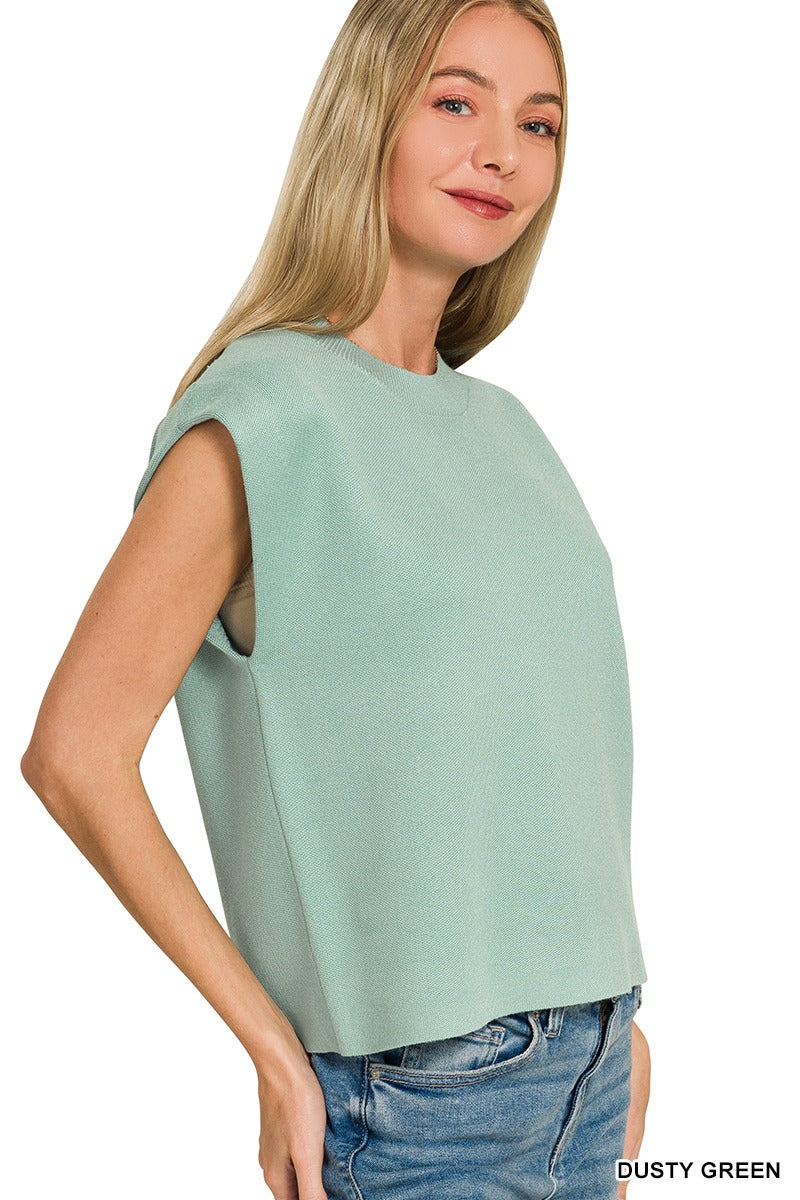 Woman wearing a dusty green sleeveless viscose sweater vest with crew neckline side view – Mirror On Main