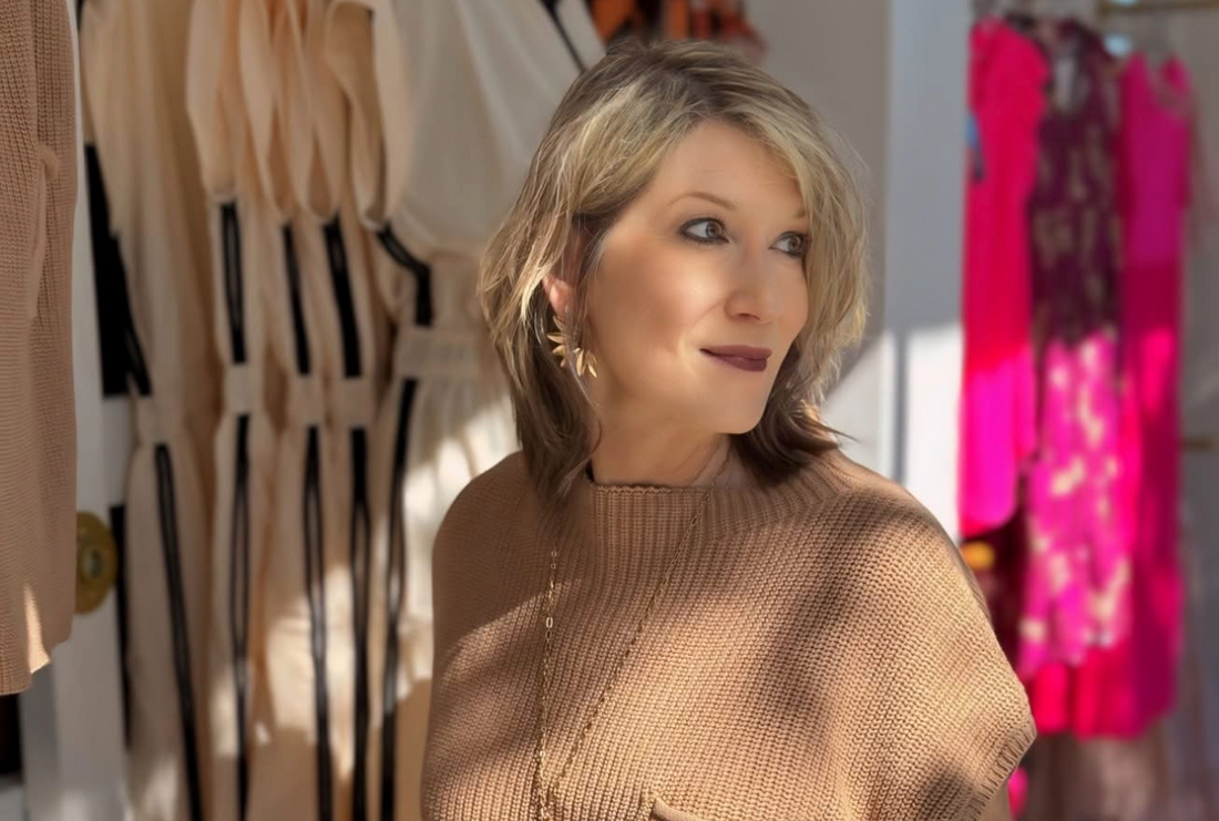 Customer wearing tan sweater from Mirror On Main in Statesboro, GA