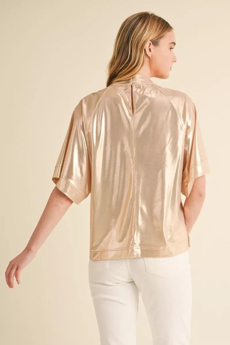 Back view of rose gold metallic top showing keyhole closure and vented hem – Mirror On Main.