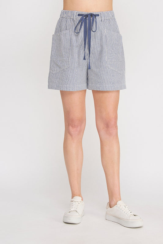 Navy and white pinstripe cotton-linen twill shorts with contrast navy drawstring tie, elastic waistband, and front and back patch pockets — Mirror on Main