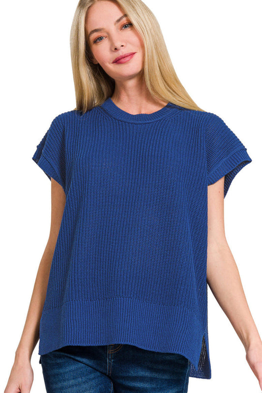 Woman wearing a blue textured t-shirt on a white background