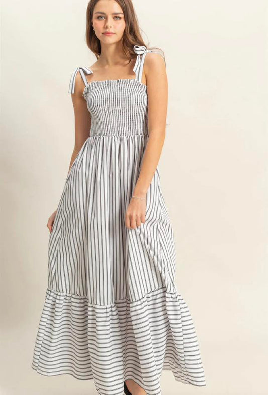 black and white striped smocked maxi dress with tie straps and tiered skirt