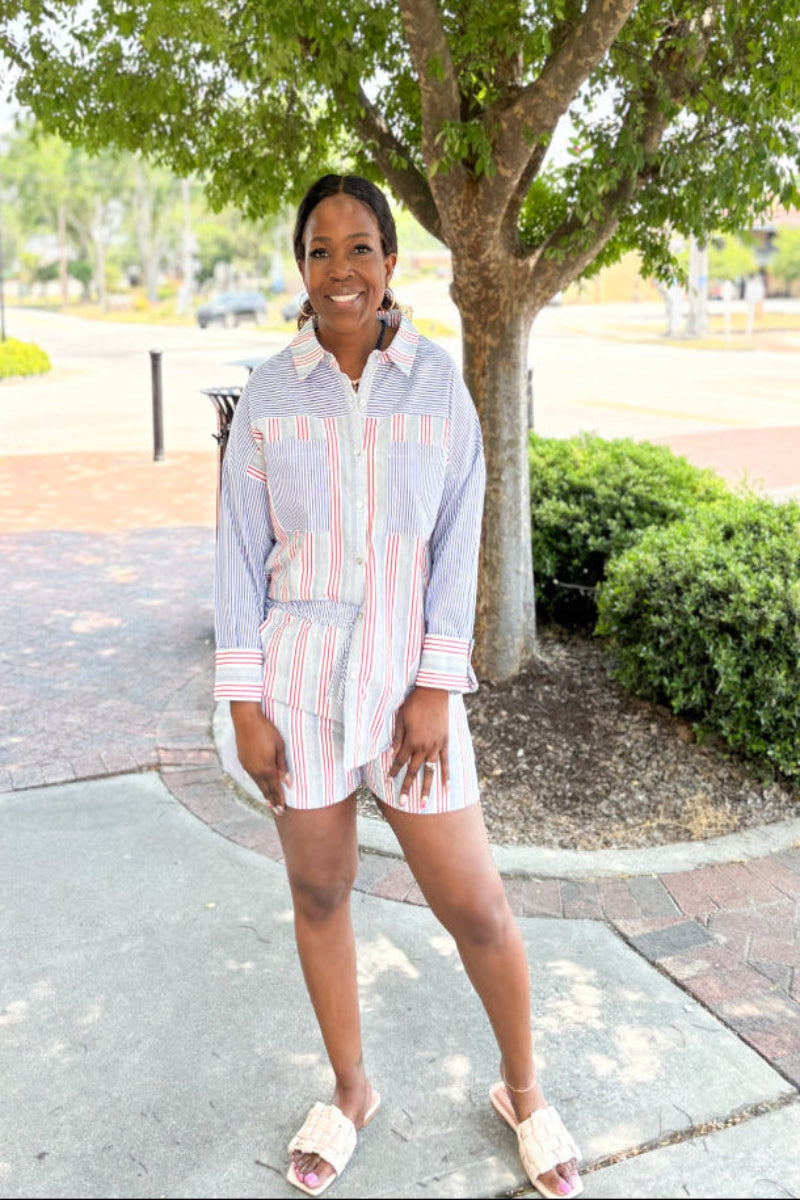 Striped oversized button-down shirt and matching elastic waist shorts set with drawstring and pockets.