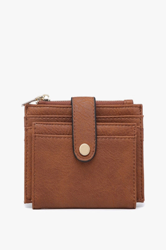 Brown leather wallet with a strap on a white background