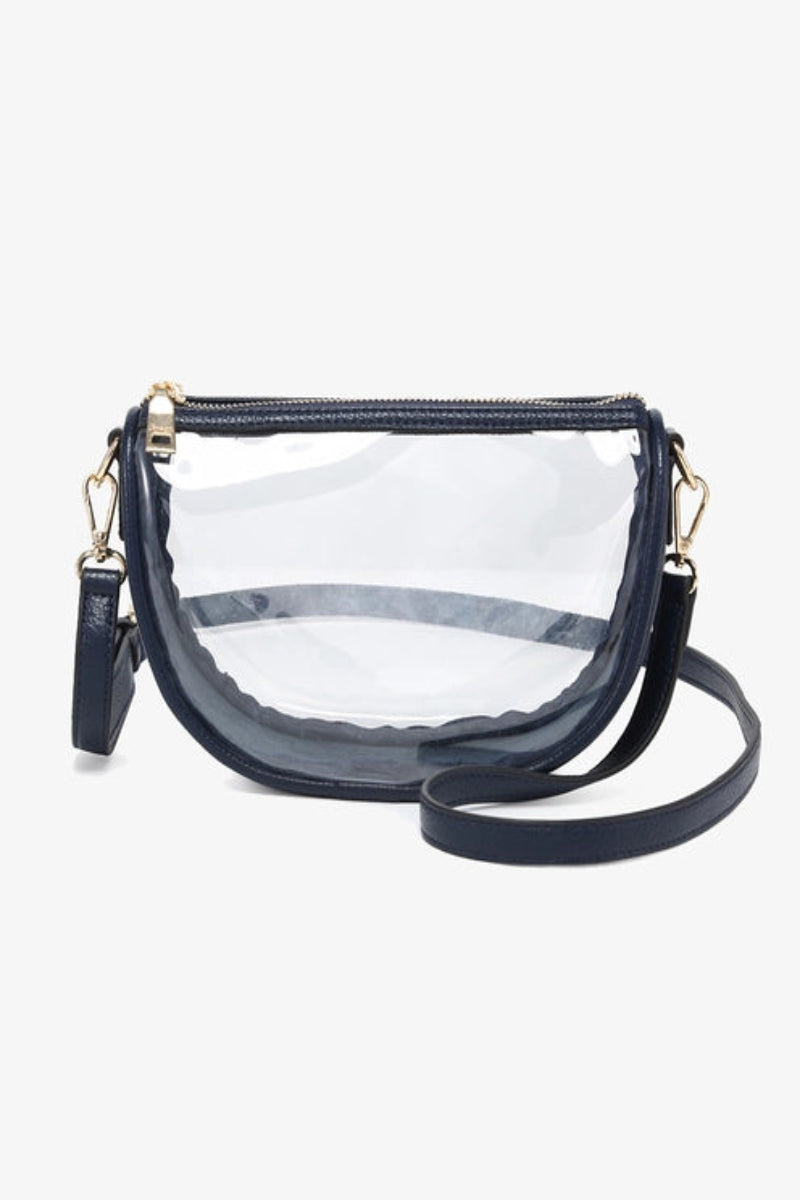 Clear handbag with navy blue accents on a white background