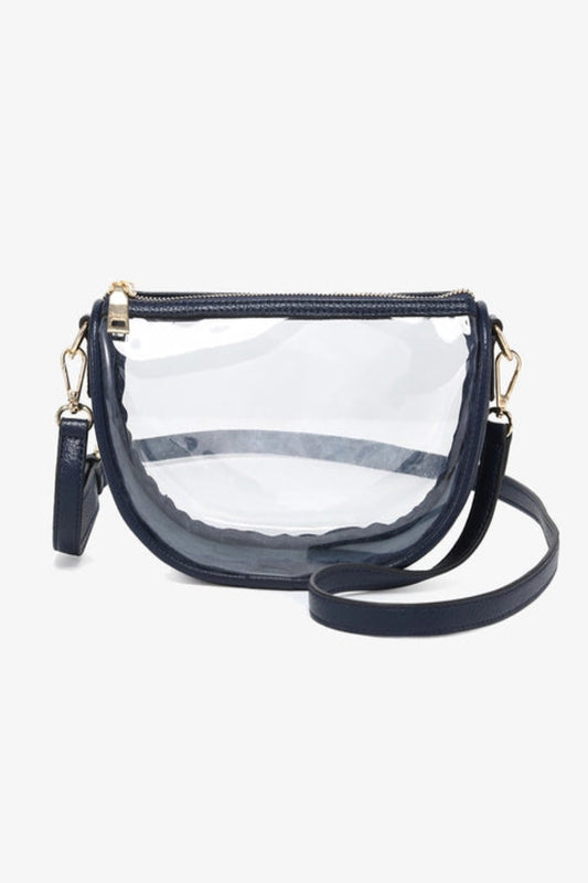 Clear handbag with navy blue accents on a white background