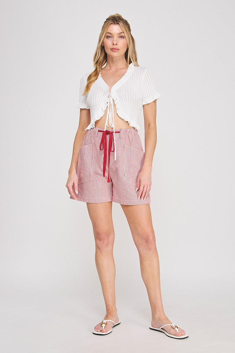 Red and white pinstripe cotton-linen twill shorts with contrast red drawstring tie, elastic waistband, and front and back patch pockets — Mirror on Main