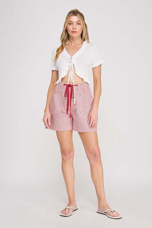 Red and white pinstripe cotton-linen twill shorts with contrast red drawstring tie, elastic waistband, and front and back patch pockets — Mirror on Main