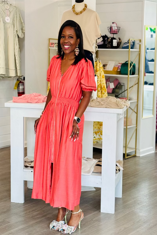 Salmon rayon midi dress with lace-trimmed V-neckline, full-length exposed front zipper, short puff sleeves with elastic cuffs and ladder lace trim, smocked waistband, and full A-line skirt with side pockets — Mirror on Main