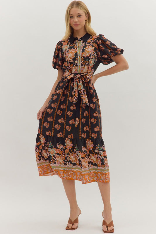 Woman wearing a floral dress on a white background