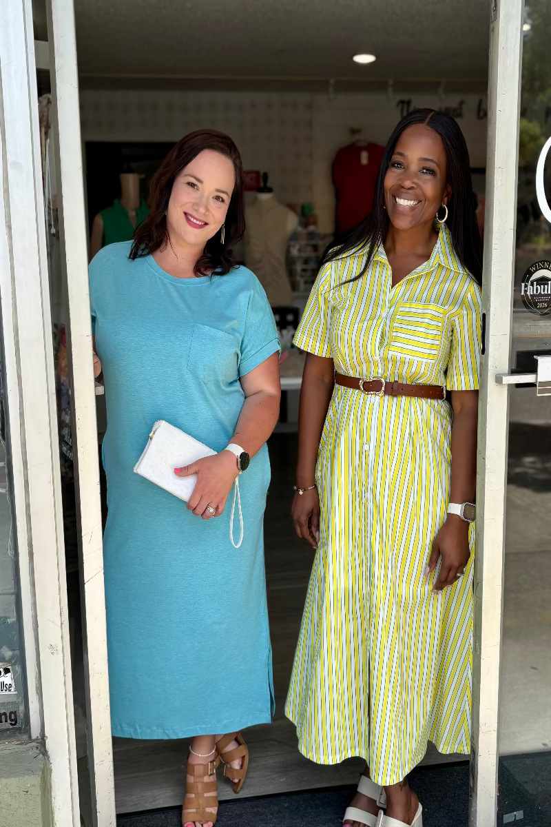 Yellow and green striped midi shirt dress with short sleeves, button front, and a belted waist at Mirror On Main