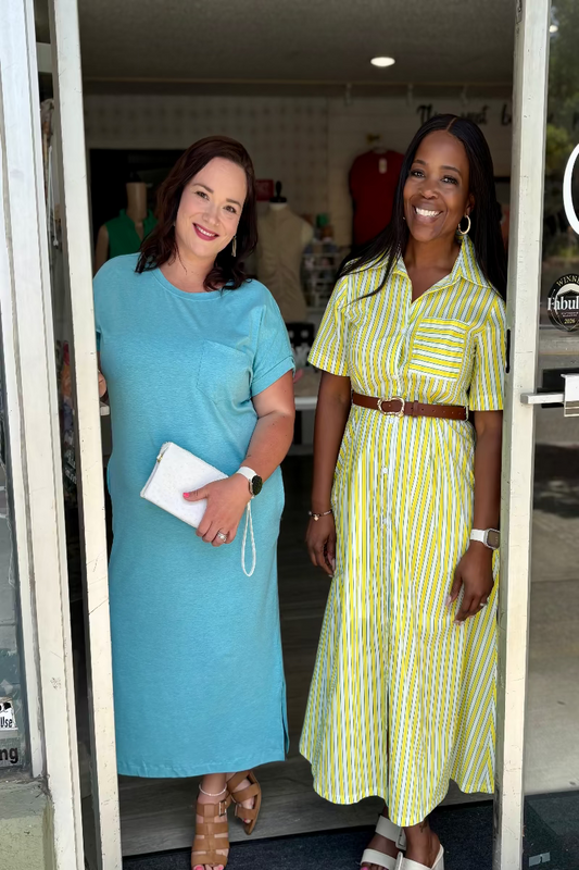 Yellow and green striped midi shirt dress with short sleeves, button front, and a belted waist at Mirror On Main