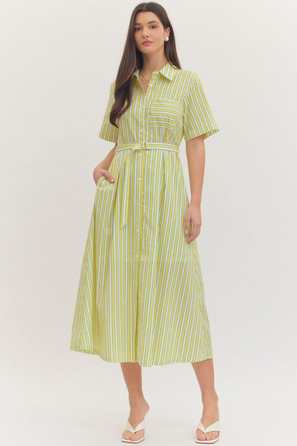 Yellow and green striped midi shirt dress with short sleeves, button front, and a belted waist.