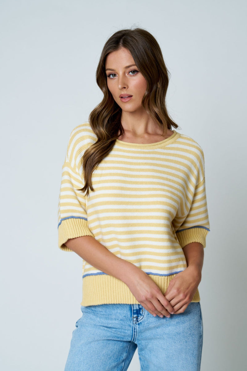 Yellow and white stripe knit sweater with raw edge round neckline, periwinkle blue contrast trim at cuffs and ribbed hem, drop shoulder, and relaxed oversized fit — Mirror on Main