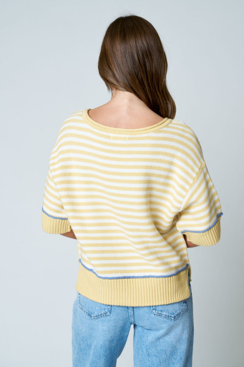 Yellow and white stripe knit sweater with raw edge round neckline, periwinkle blue contrast trim at cuffs and ribbed hem, drop shoulder, and relaxed oversized fit — Mirror on Main