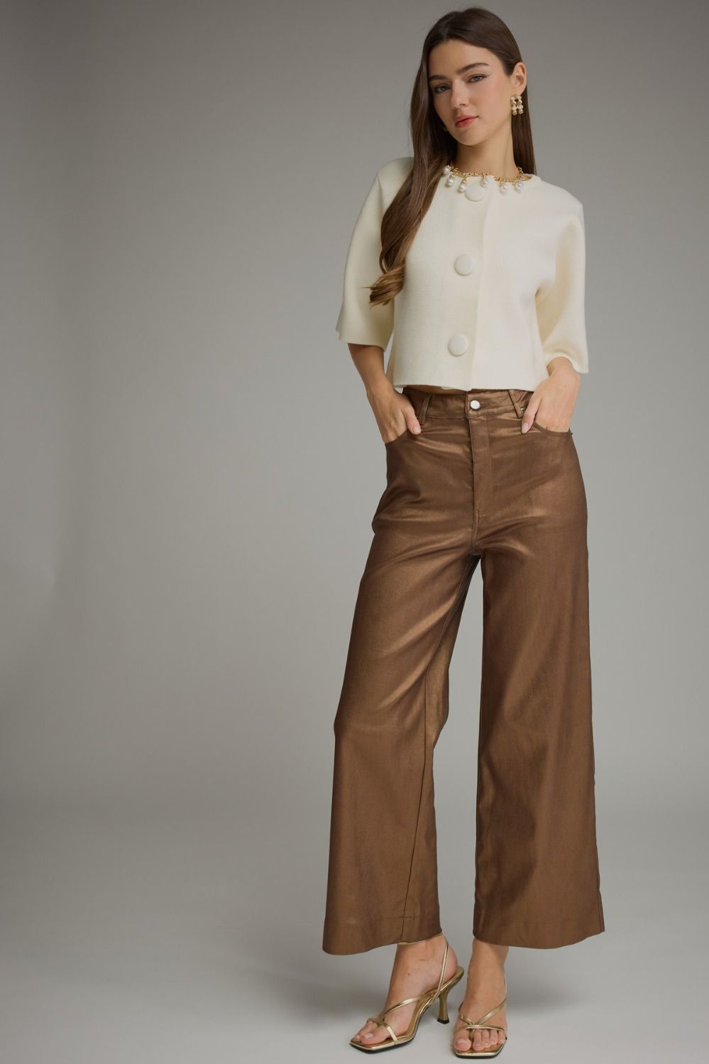 Woman wearing metallic wide leg pants with belt loops and a button front – Mirror On Main