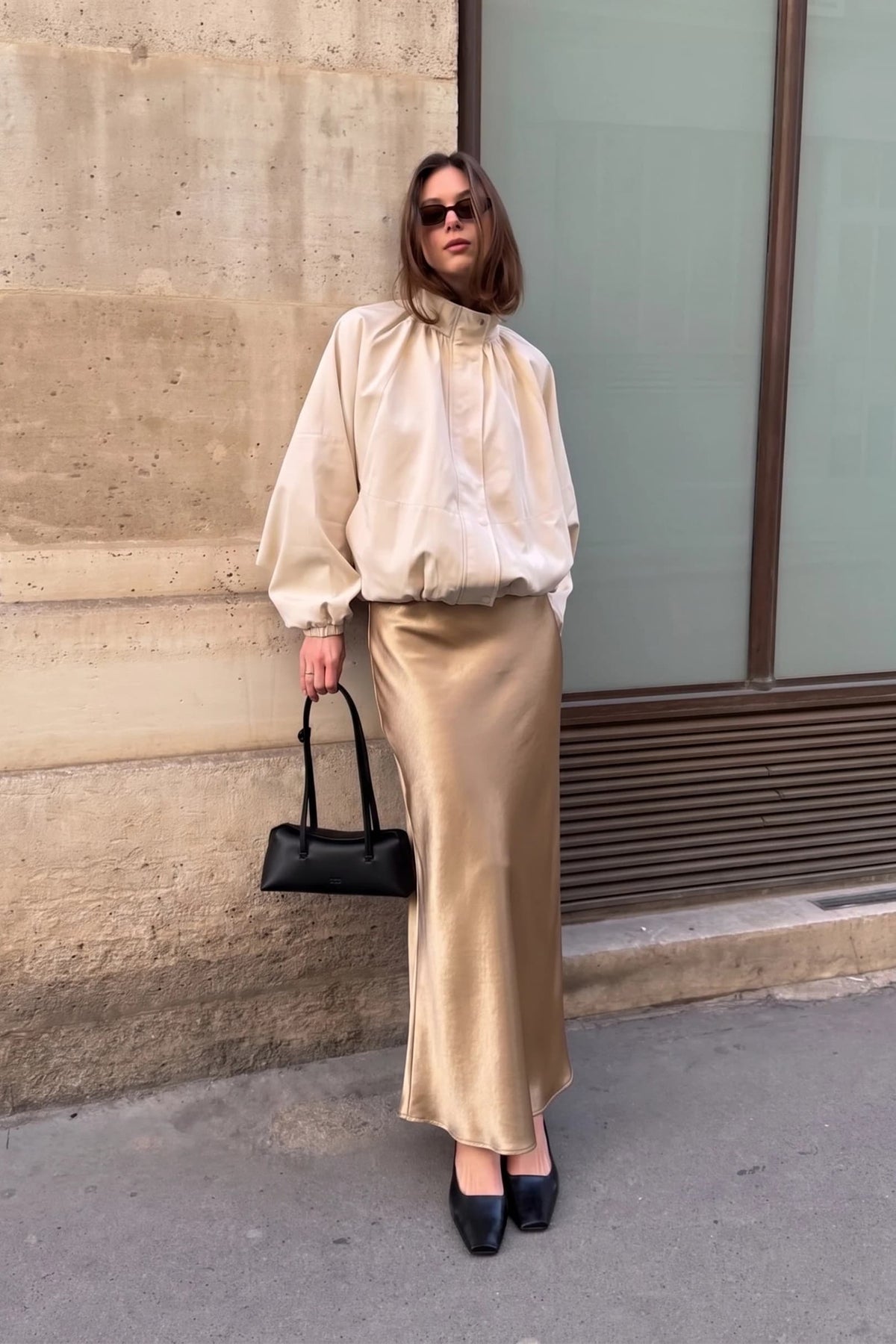 Woman wearing a taupe glitter midi skirt – Mirror On Main