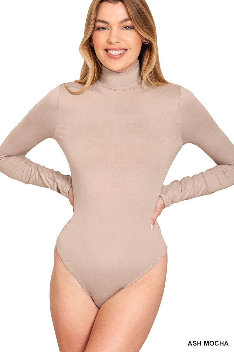 Woman wearing an ash mocha mock neck long sleeve fitted bodysuit – Mirror On Main