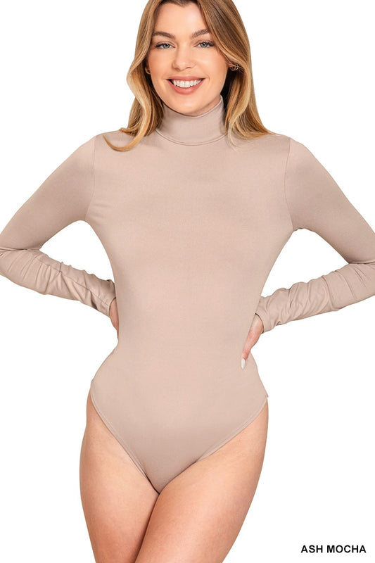 Woman wearing an ash mocha mock neck long sleeve fitted bodysuit – Mirror On Main