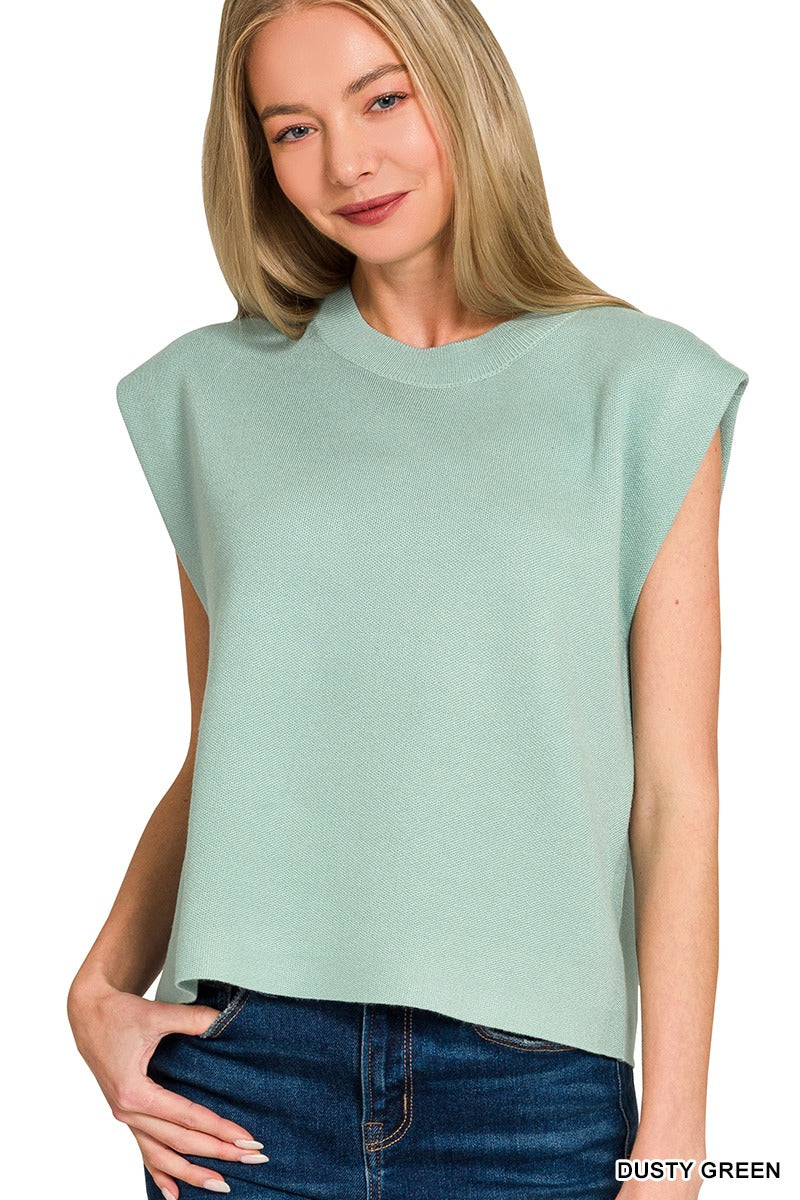Woman wearing a dusty green sleeveless viscose sweater vest with crew neckline – Mirror On Main